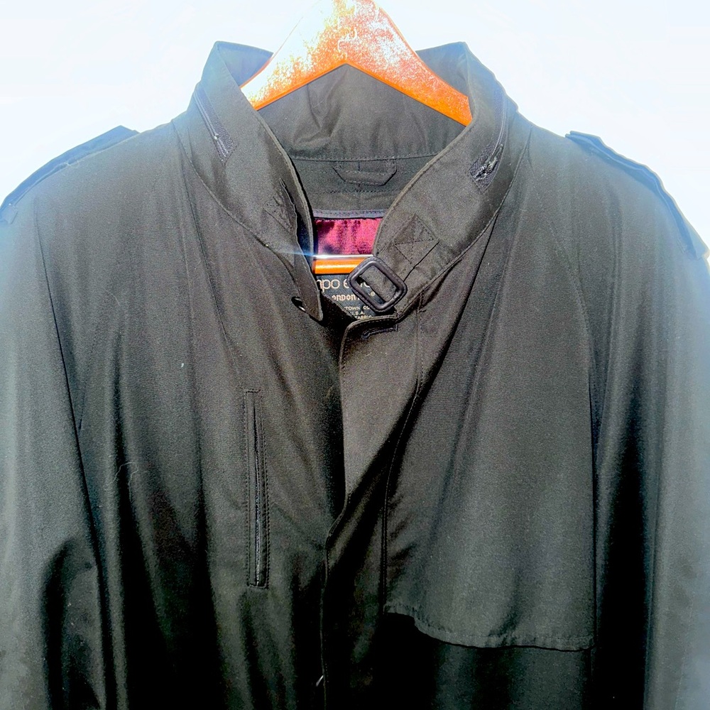 Men’s London Fog full length black raincoat. Size 44 long, made in the USA.